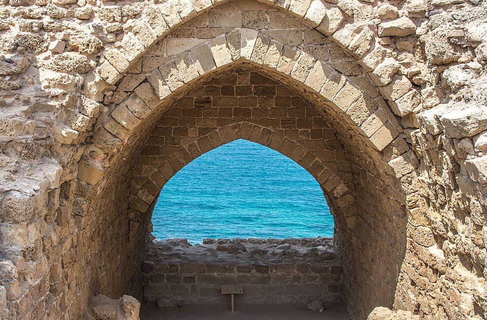Crusader pointed arch framing the Mediterranean Sea at Apollonia-Arsuf