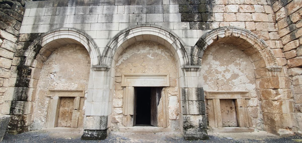 The triple-arched facade of the Cave of the Coffins at Beit Shearim necropolis