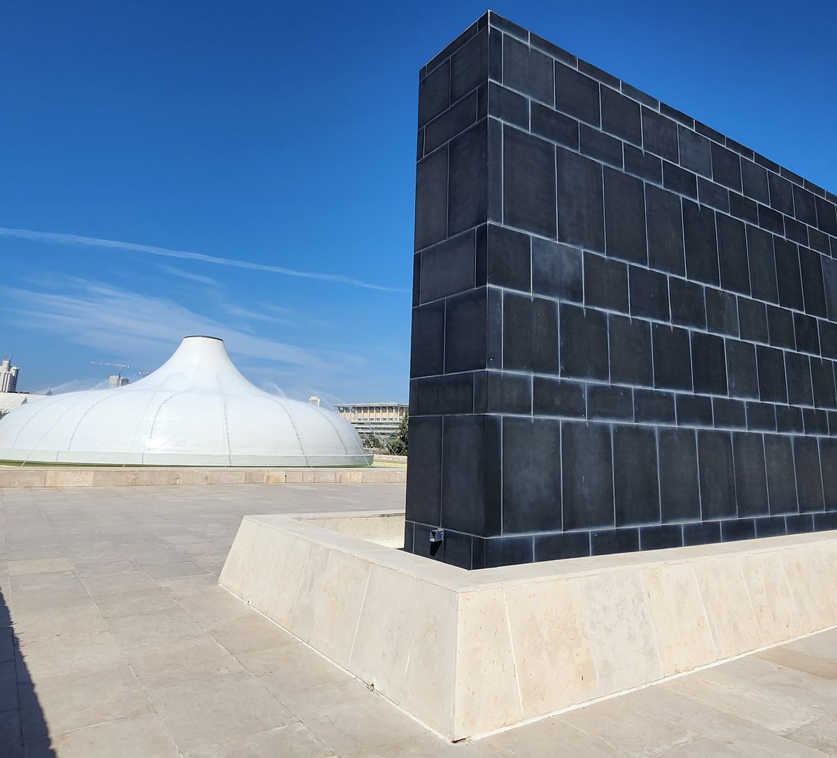 The Shrine of the Book at the Israel Museum with the white dome and black basalt wall