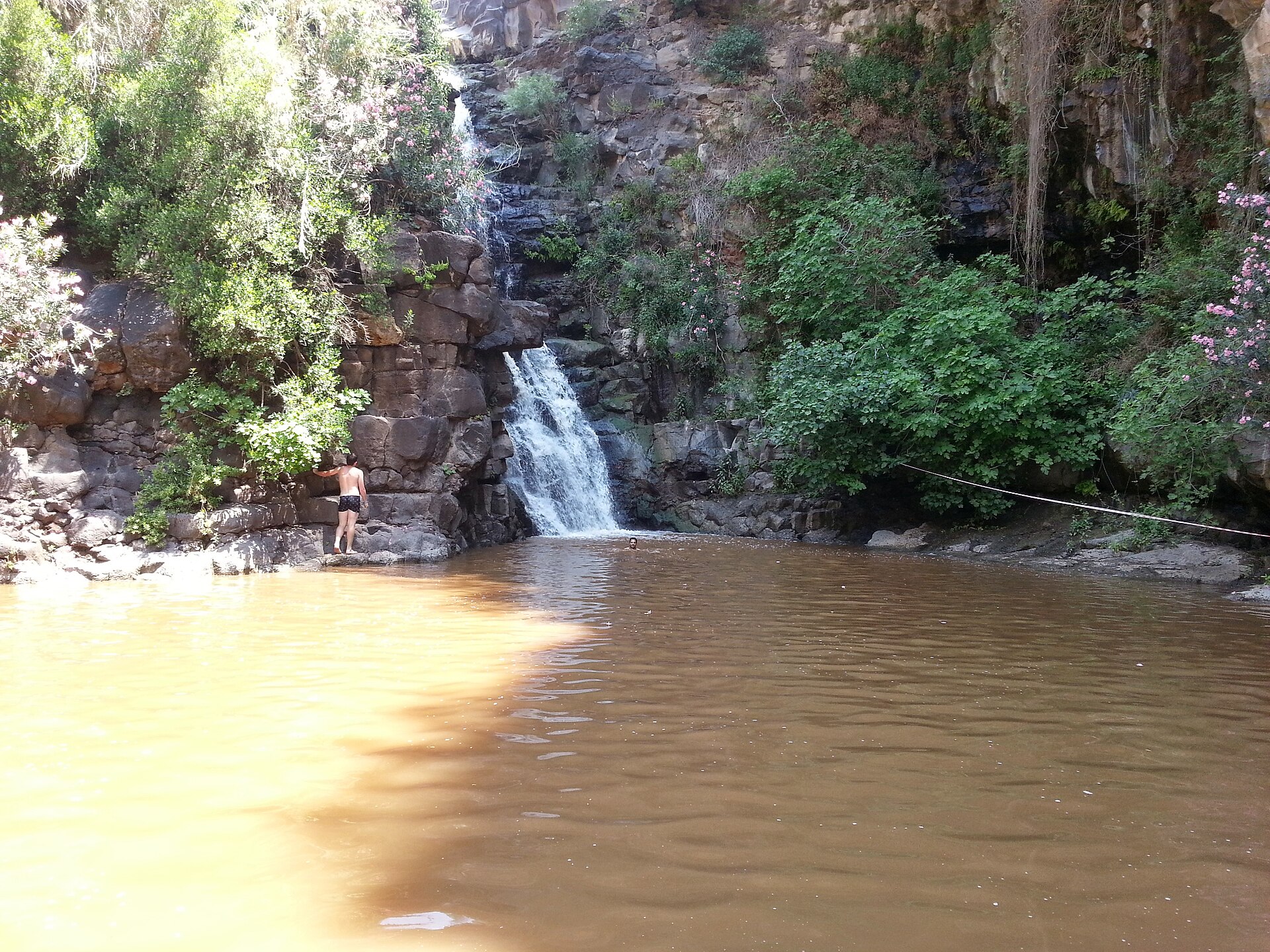 Waterfall and natural pool at Yehudiya Nature Reserve on the Golan Heights